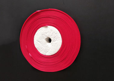 ประเทศจีน โพลีเอสเตอร์ Spandex ริบบิ้นสีแดงซาตินริบบิ้นม้วนผ้าซาตินริบบิ้นที่มีความทนทาน โรงงาน