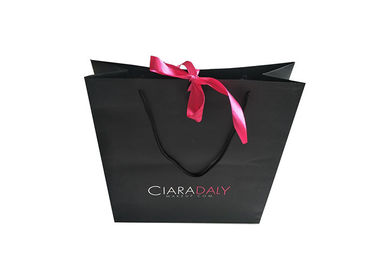 ประเทศจีน ร้านค้าปลีกปลีกย่อย Glitter Retail ช็อปปิ้งกระเป๋า Ribbon Closure Glossy Lamination Sturdy โรงงาน